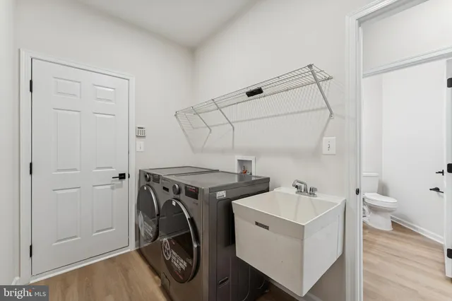 a utility room with dryer and washer