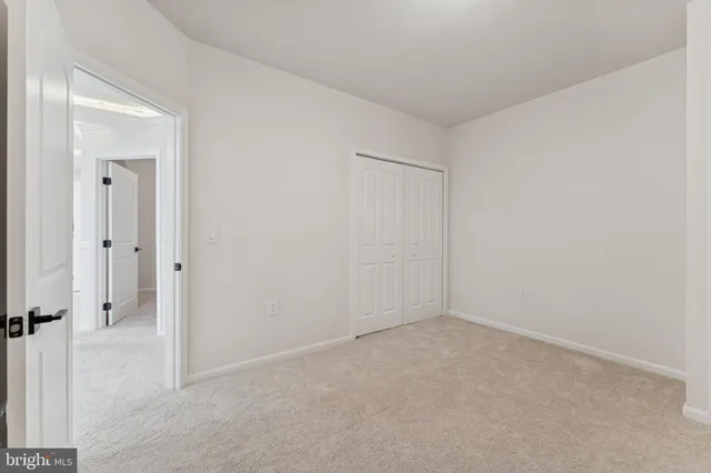 an empty room with an entryway