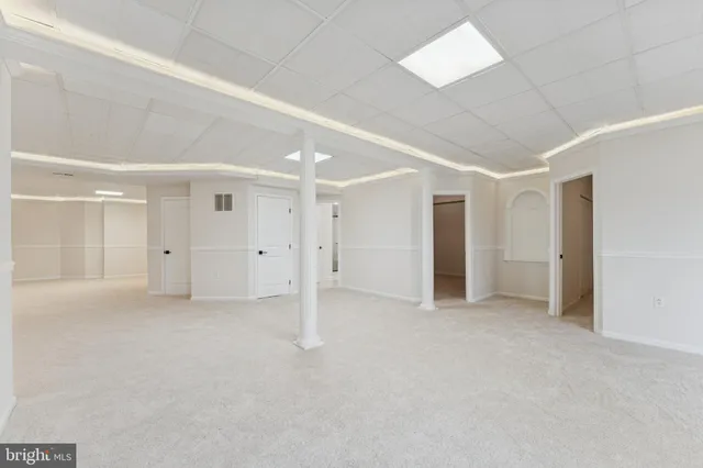 a view of a balcony with wooden floor