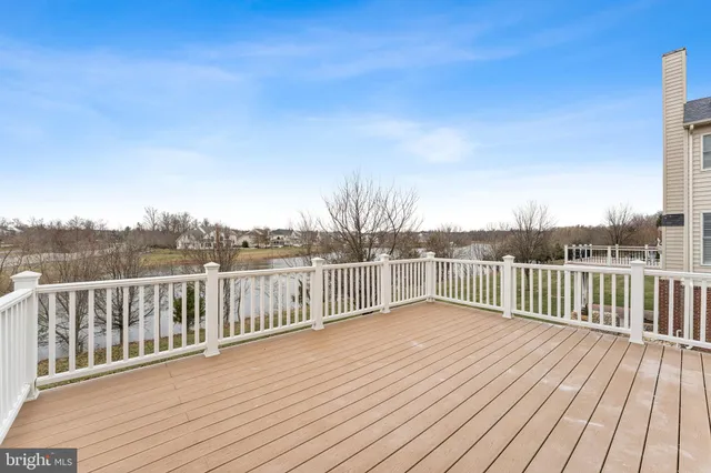 a big yard with lots of green space and trees