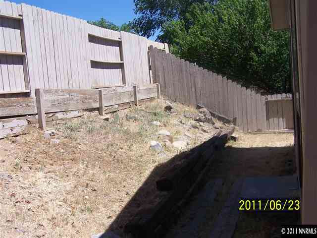 2750 Larkspur Street Reno, NV 89512 - Photo 11 of 12 a view of a wooden fence