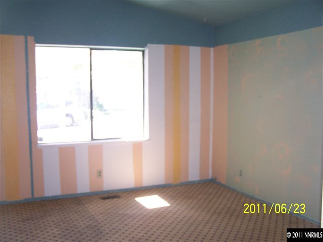 2750 Larkspur Street Reno, NV 89512 - Photo 6 of 12 an empty room with windows