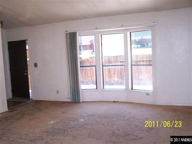 2750 Larkspur Street Reno, NV 89512 - Photo 7 of 12 an empty room with windows