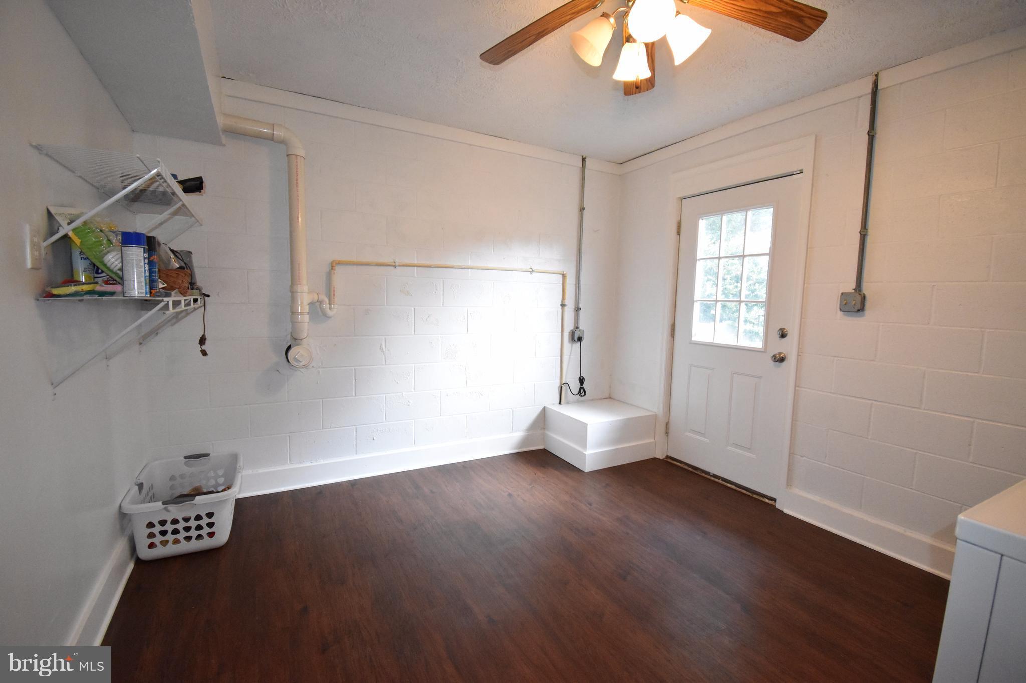 6901 Rabbit Run Hurlock, MD 21643 - Photo 23 of 30 Laundry Room w/ outdoor access