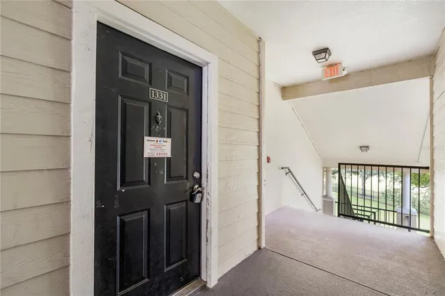 a view of a livingroom and a window