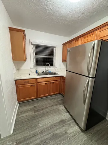 a en suite bathroom with a sink a mirror and a bathtub