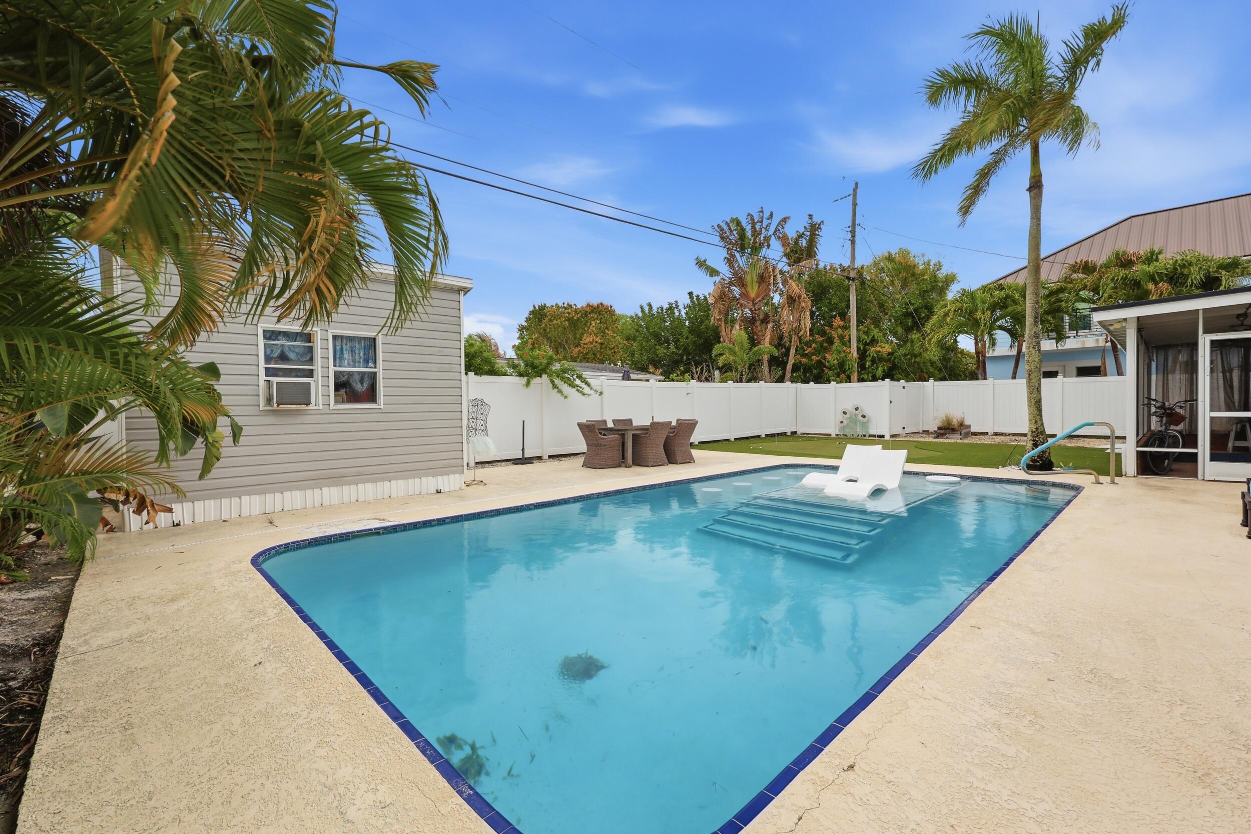 1516 Seabrook Road Jupiter, FL 33469 - Photo 2 of 3 8p3a2022