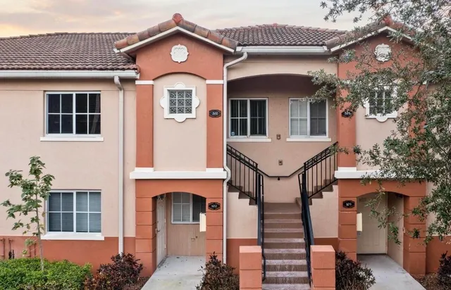 a front view of a house with a porch