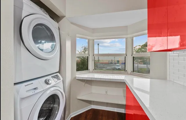 a view of living room with washer and dryer
