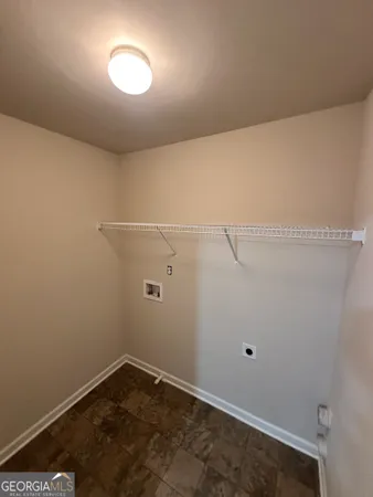 a view of a room with racks on the wall