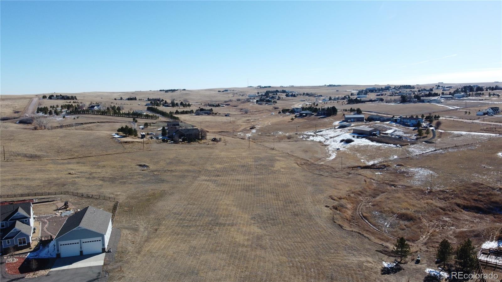 3131 Antelope Ridge Trail Parker, CO 80138 - Photo 6 of 13 an aerial view of a beach with ocean view