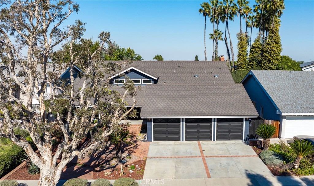 1810 Tanager Drive Costa Mesa, CA 92626 - Photo 2 of 55 a house with trees in front of it