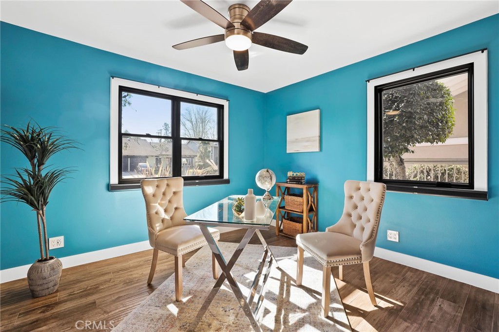 1810 Tanager Drive Costa Mesa, CA 92626 - Photo 23 of 55 a view of a dining room with furniture window and wooden floor
