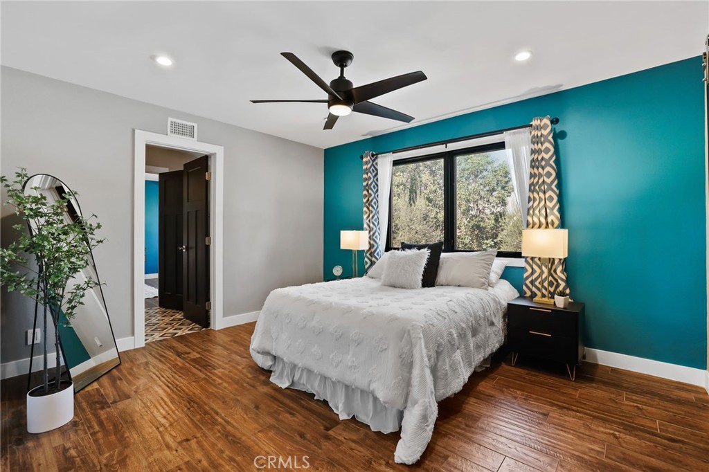 1810 Tanager Drive Costa Mesa, CA 92626 - Photo 30 of 55 a bedroom with a large bed and a large window