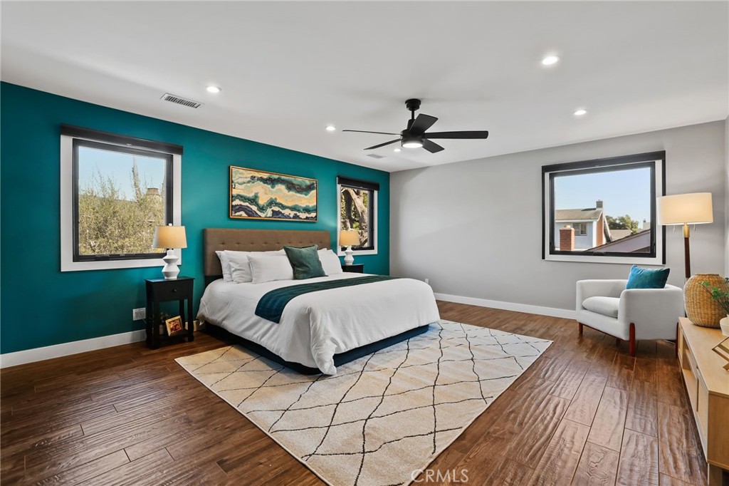 1810 Tanager Drive Costa Mesa, CA 92626 - Photo 31 of 55 a bedroom with a large bed and a window