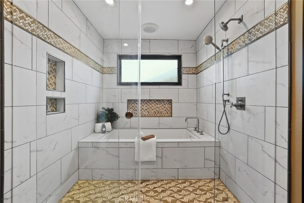 1810 Tanager Drive Costa Mesa, CA 92626 - Photo 36 of 55 a bathroom with a bathtub and shower