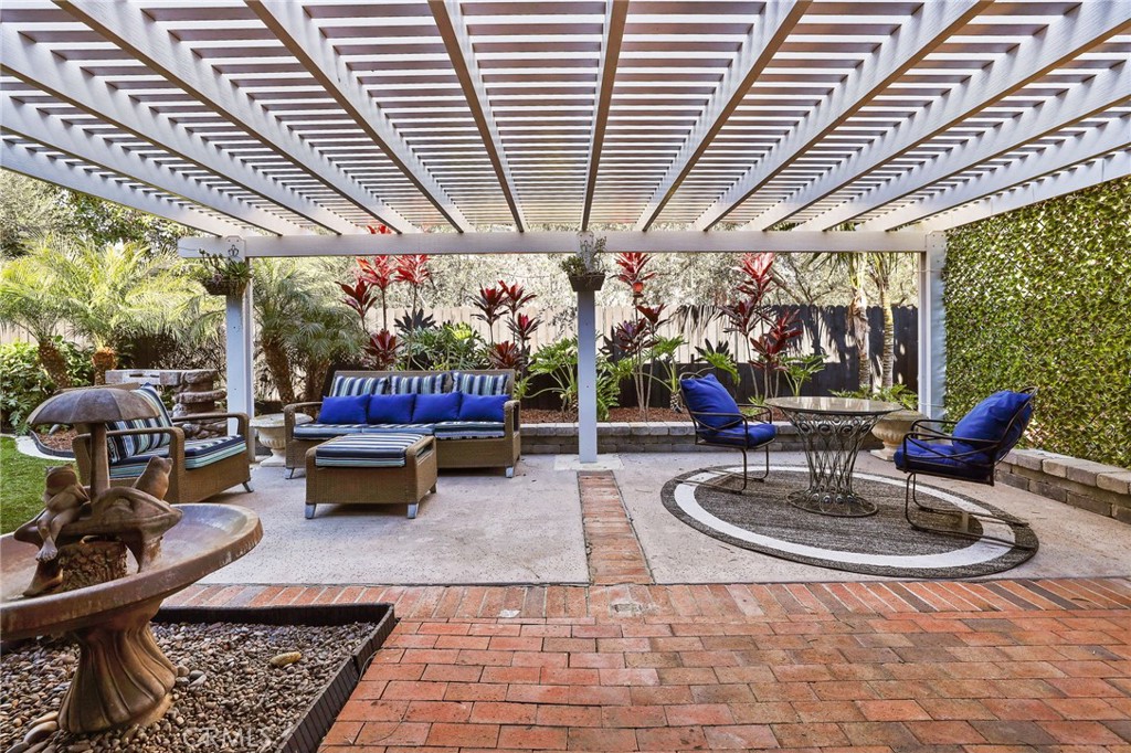 1810 Tanager Drive Costa Mesa, CA 92626 - Photo 40 of 55 a outdoor living space with patio furniture and a potted plant