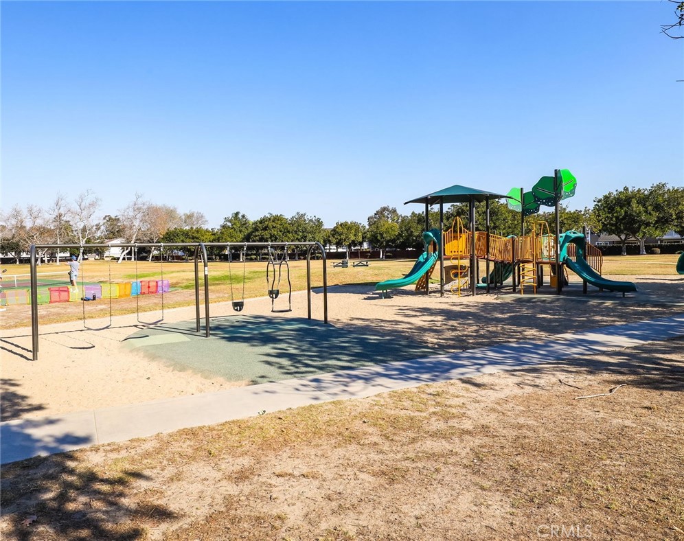 1810 Tanager Drive Costa Mesa, CA 92626 - Photo 46 of 55 a view of a swimming pool with an ocean