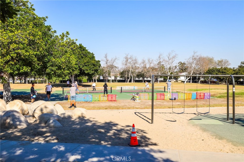 1810 Tanager Drive Costa Mesa, CA 92626 - Photo 47 of 55 a view of a swimming pool with an outdoor seating