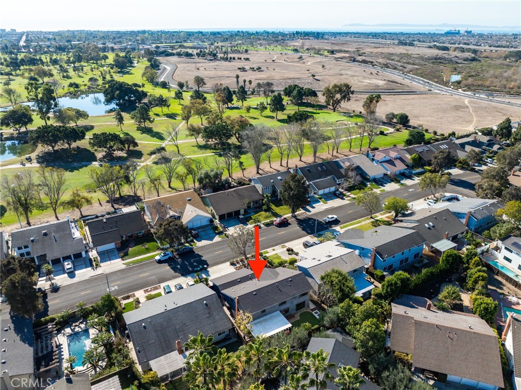 1810 Tanager Drive Costa Mesa, CA 92626 - Photo 54 of 55 an aerial view of a houses with a lake