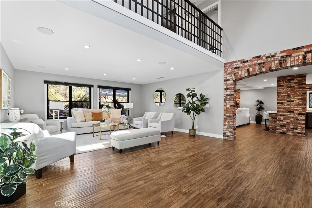 1810 Tanager Drive Costa Mesa, CA 92626 - Photo 7 of 55 a living room with furniture and wooden floor