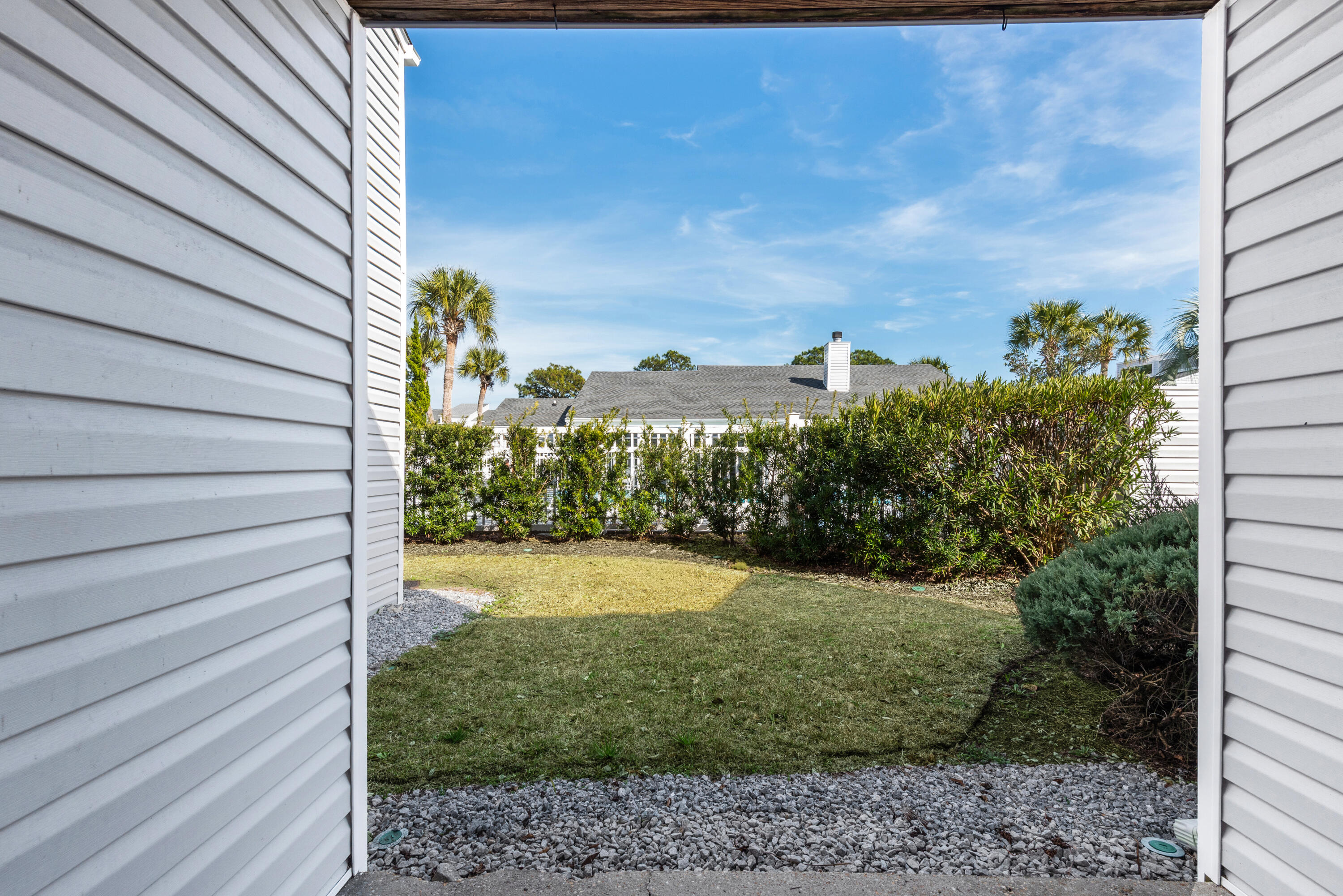 101 Old Ferry Road, Unit 10B Shalimar, FL 32579 - Photo 20 of 30 a view of a yard with wooden fence