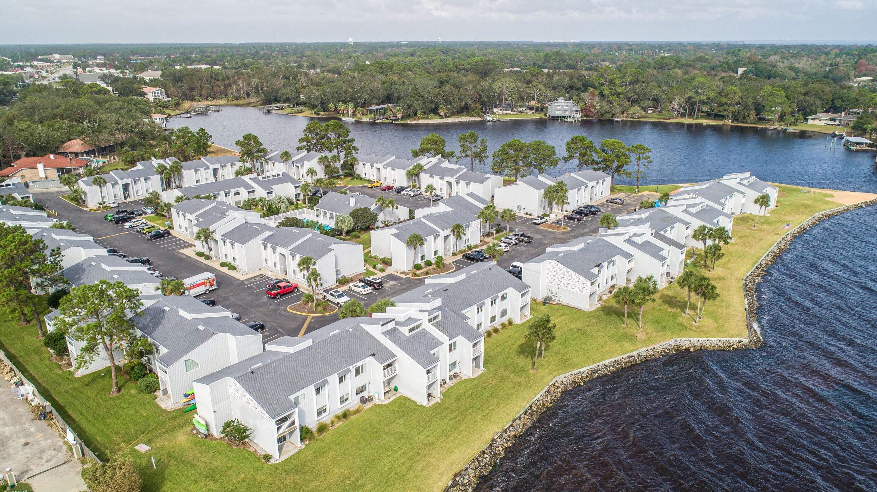 101 Old Ferry Road, Unit 10B Shalimar, FL 32579 - Photo 28 of 30 a view of a lake with a mountain view