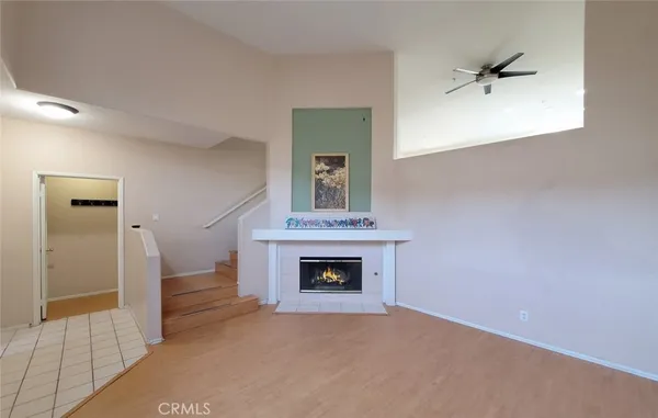 a kitchen that has a sink stove and cabinets