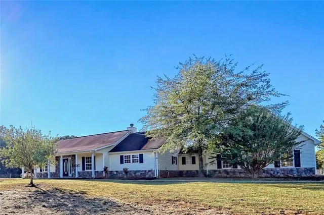 a view of house with outdoor space