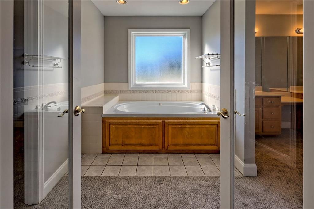 539 B B Wilson Road Commerce, GA 30529 - Photo 31 of 70 a bathroom with a sink and a mirror