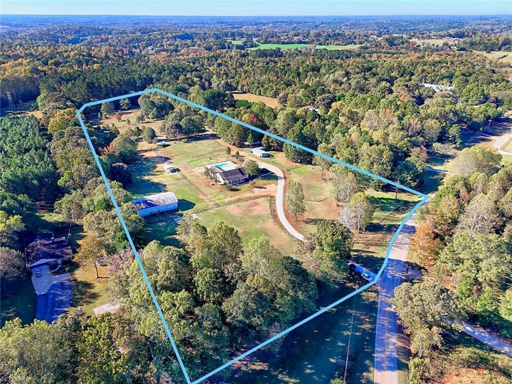 539 B B Wilson Road Commerce, GA 30529 - Photo 6 of 70 an aerial view of a house with a swimming pool