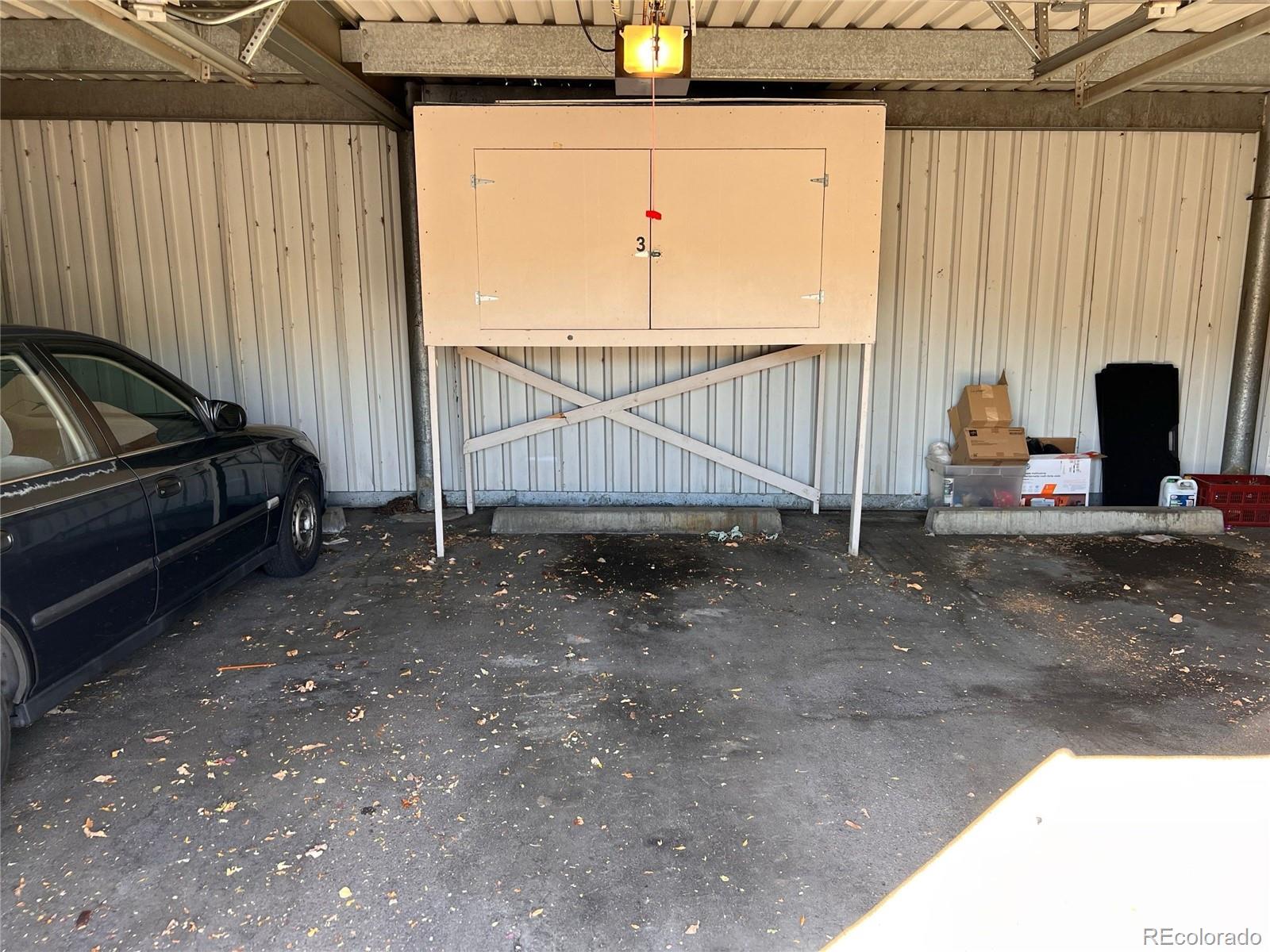 660 South Alton Way, Unit 4A Denver, CO 80247 - Photo 23 of 28 a view of a backyard with a chair