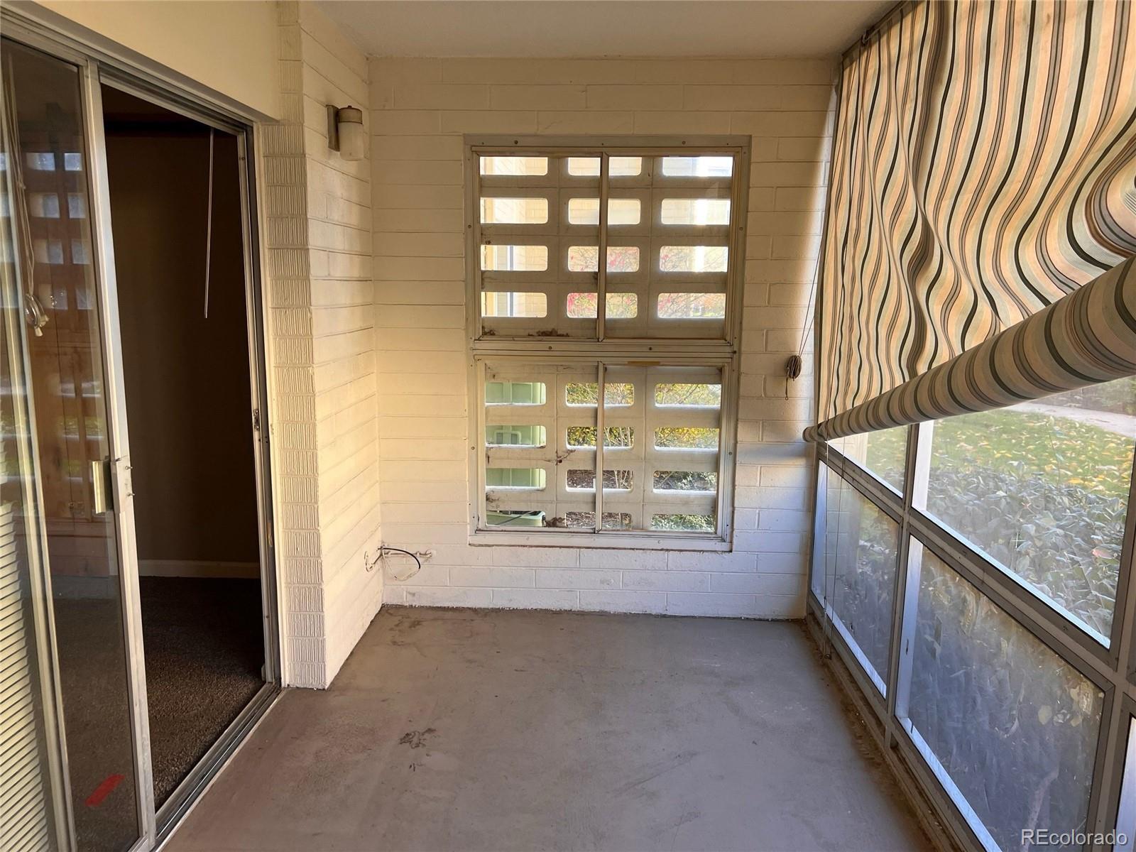 660 South Alton Way, Unit 4A Denver, CO 80247 - Photo 25 of 28 a view of an entryway and livingroom