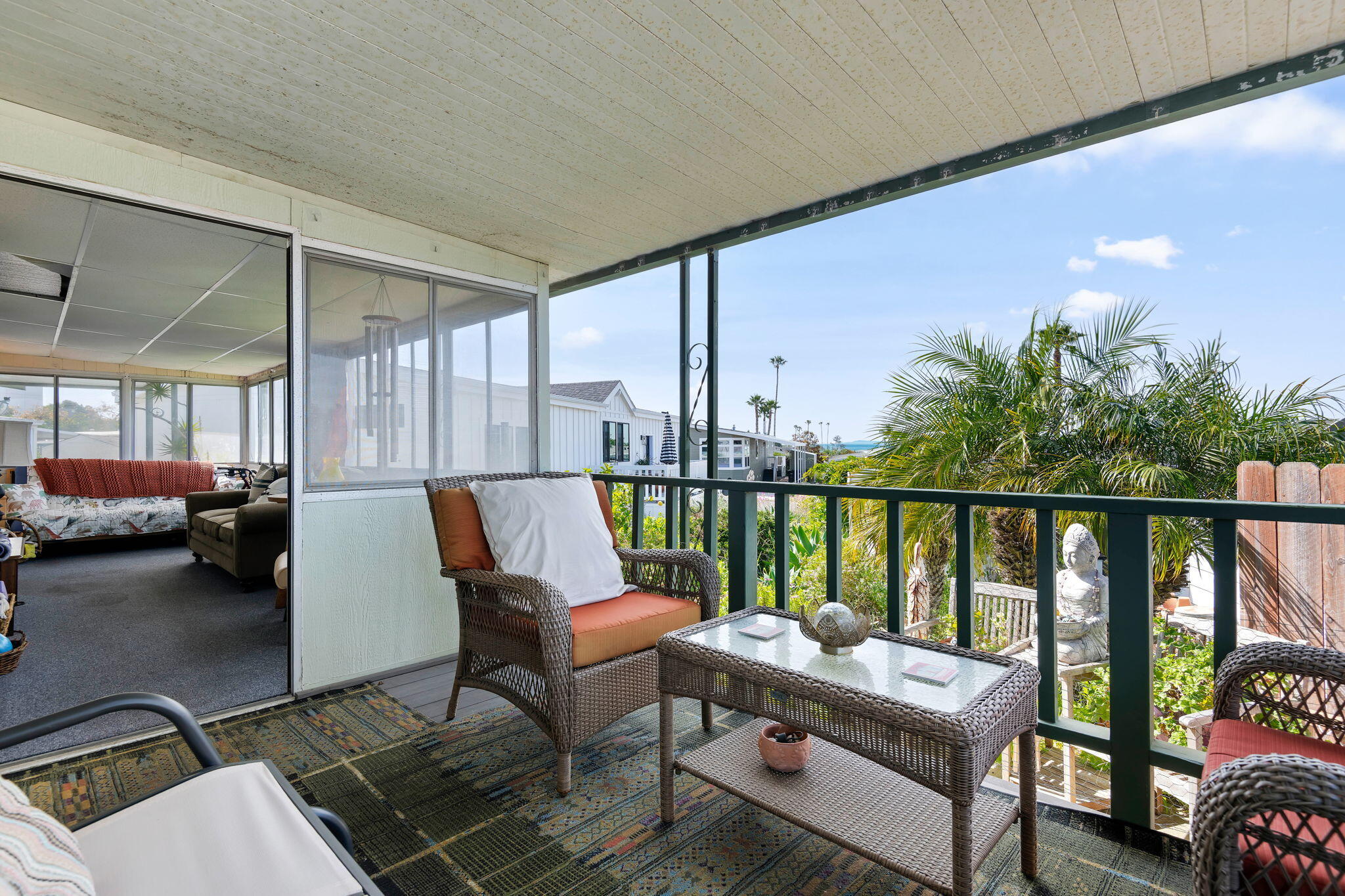 6180 Via Real, Unit 32 Carpinteria, CA 93013 - Photo 18 of 34 a balcony with furniture and a potted plant