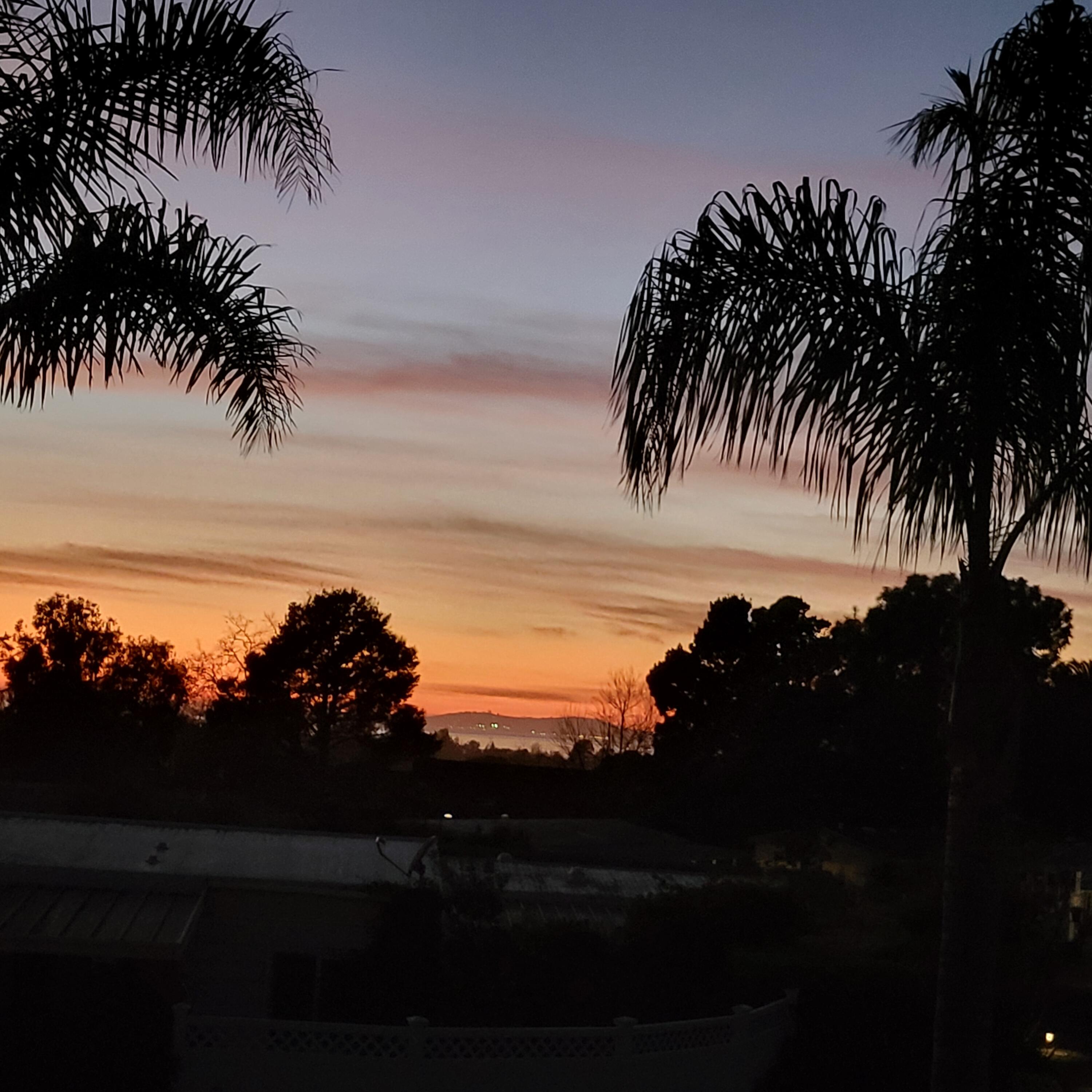 6180 Via Real, Unit 32 Carpinteria, CA 93013 - Photo 20 of 34 a view of beach and sunset