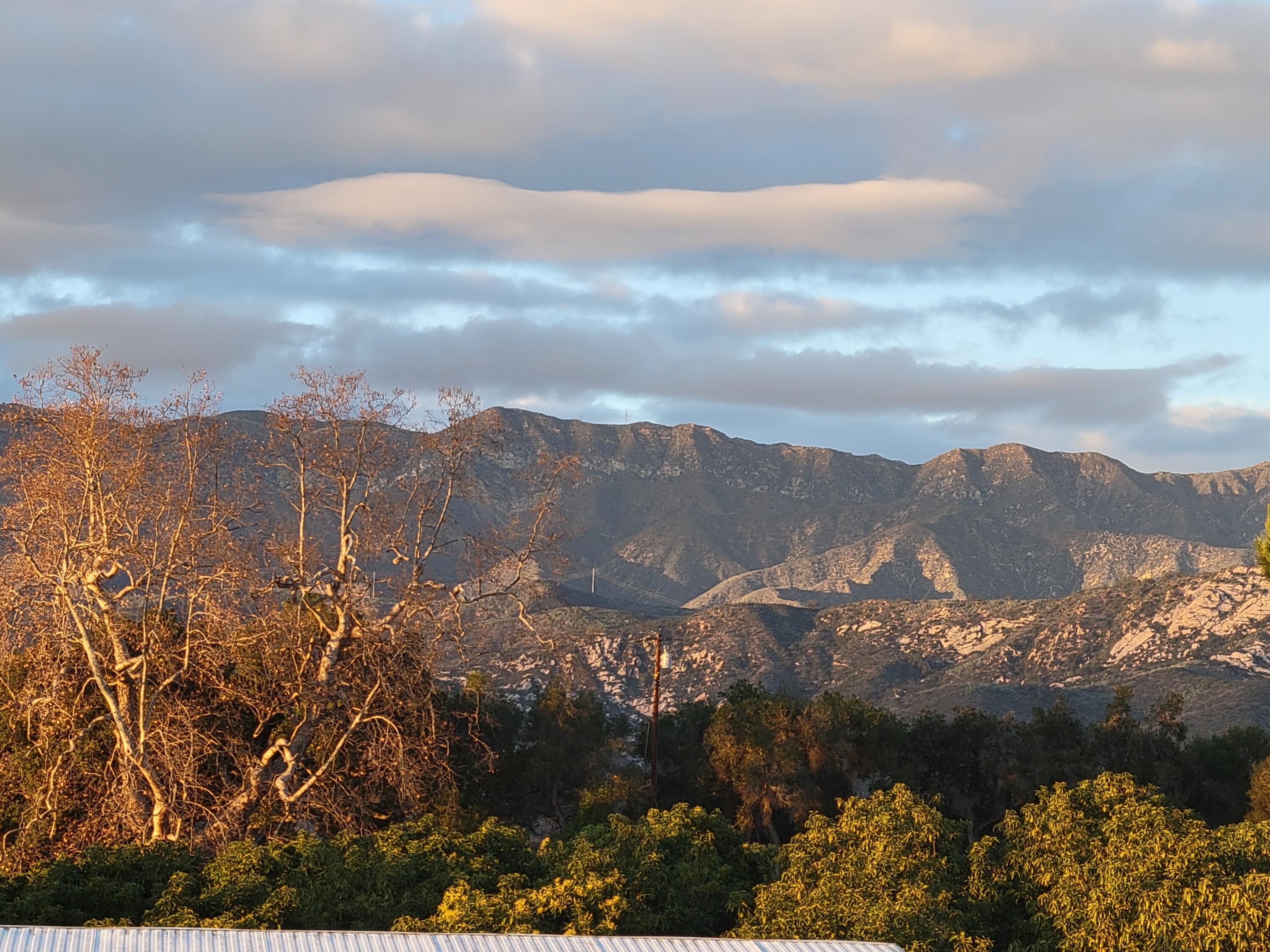6180 Via Real, Unit 32 Carpinteria, CA 93013 - Photo 22 of 34 a view of a city with mountains in the background