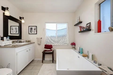 a very nice looking room with a sink