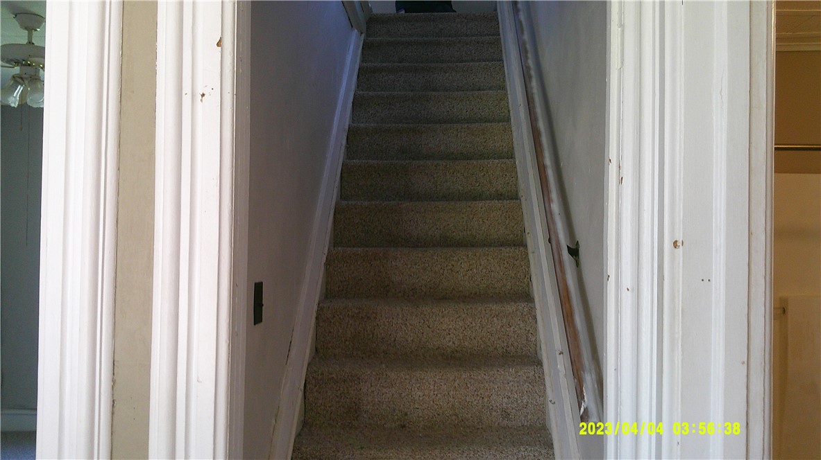 1878 Fairground Road Brookfield, NY 13485 - Photo 7 of 21 Heading upstairs from dining room area