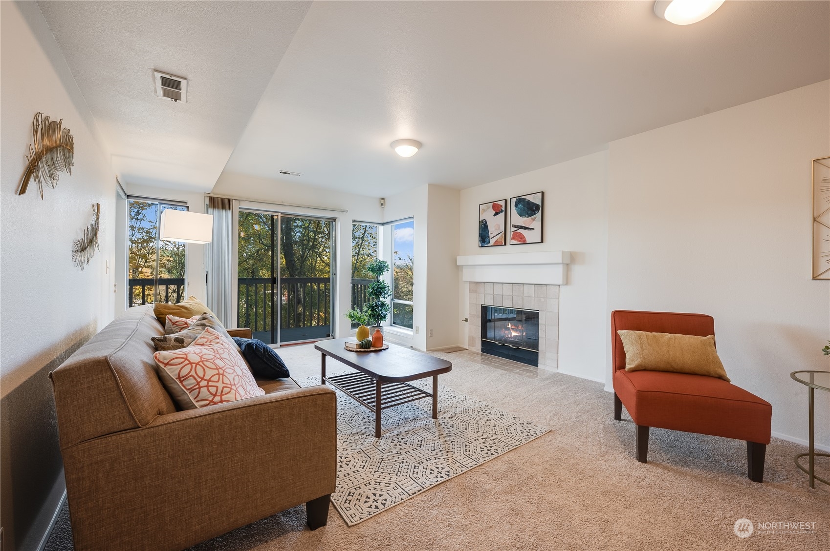 7250 Old Redmond Road, Unit C112 Redmond, WA 98052 - Photo 17 of 30 a living room with furniture and a fireplace