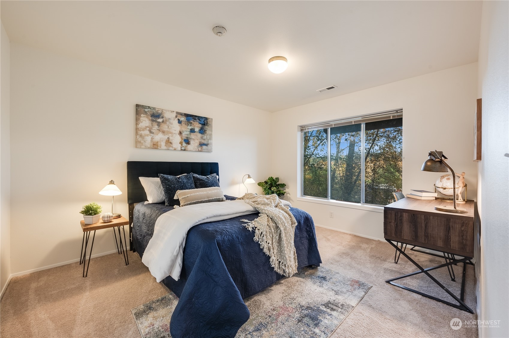 7250 Old Redmond Road, Unit C112 Redmond, WA 98052 - Photo 18 of 30 a bed room with a bed and a chair