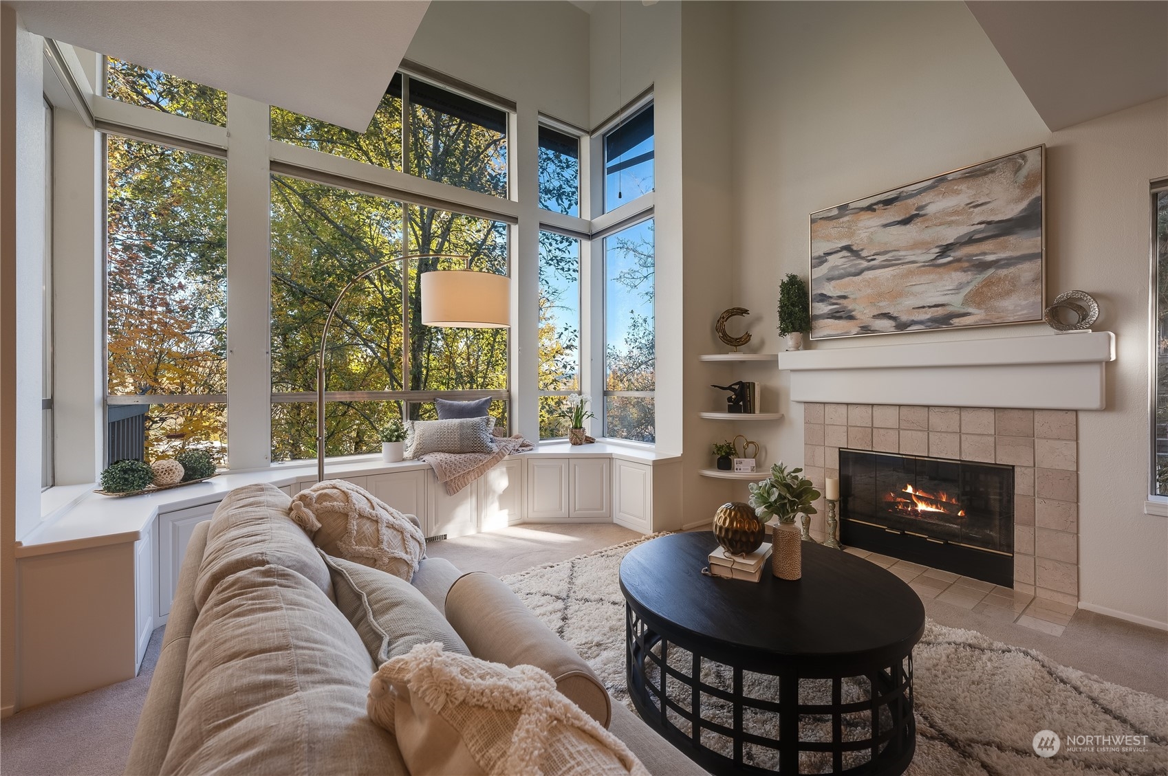 7250 Old Redmond Road, Unit C112 Redmond, WA 98052 - Photo 7 of 30 a living room with furniture a large window and a fireplace