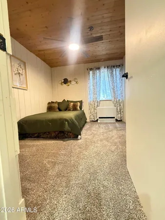 a utility room with closet dryer and washer