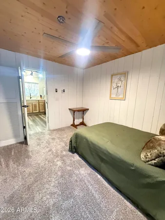 a view of livingroom with hardwood floor and front door