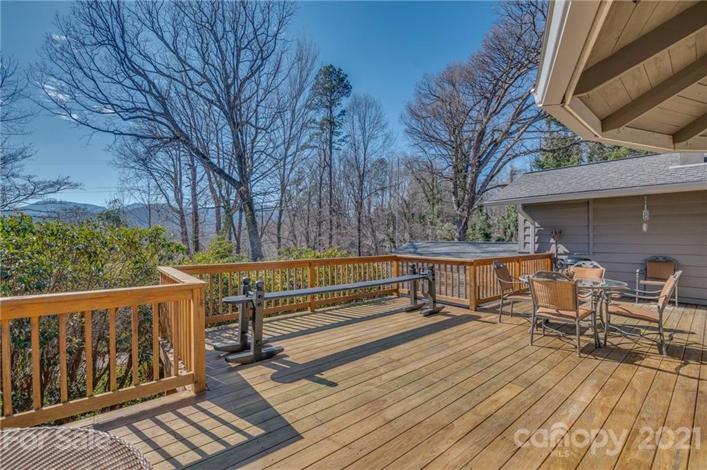 172 Wilderness Road Tryon, NC 28782 - Photo 21 of 46 a view of balcony with wooden floor and seating space
