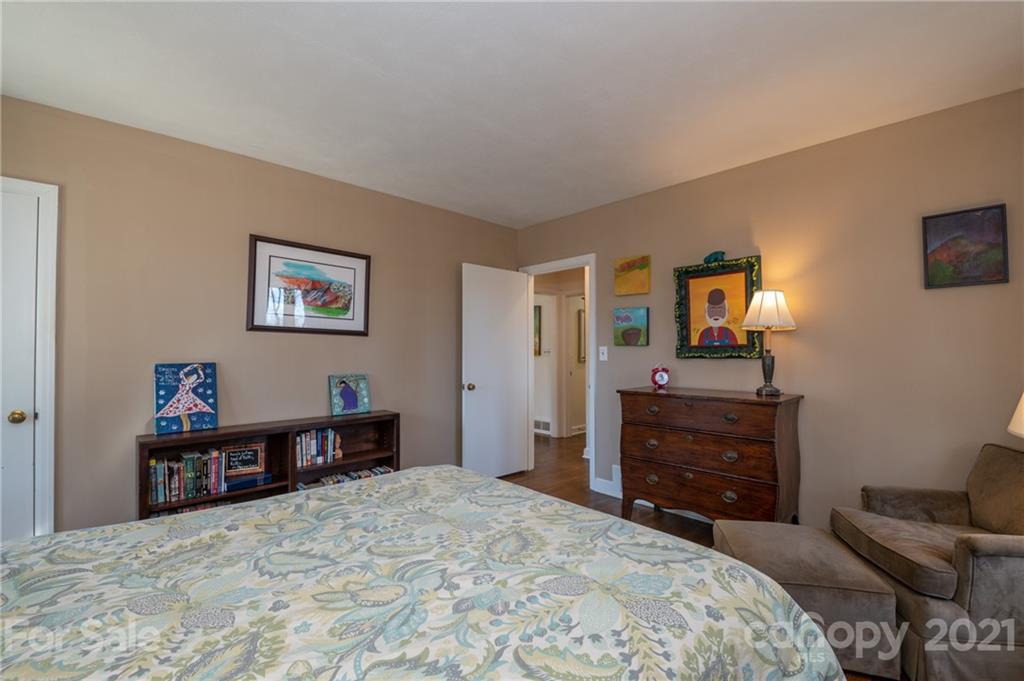 172 Wilderness Road Tryon, NC 28782 - Photo 31 of 46 a bedroom with a bed and furniture