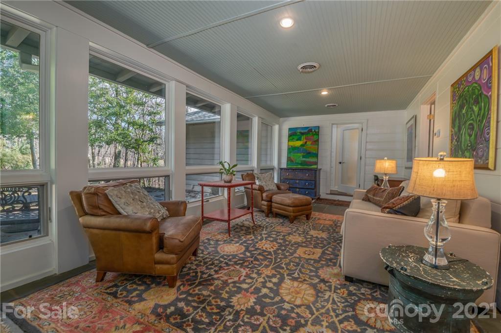 172 Wilderness Road Tryon, NC 28782 - Photo 7 of 46 a living room with furniture and a large window