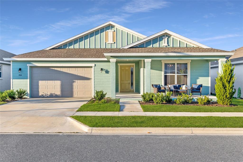 7431 Southwest 65th Place Road Ocala, FL 34474 - Photo 1 of 49 a front view of a house
