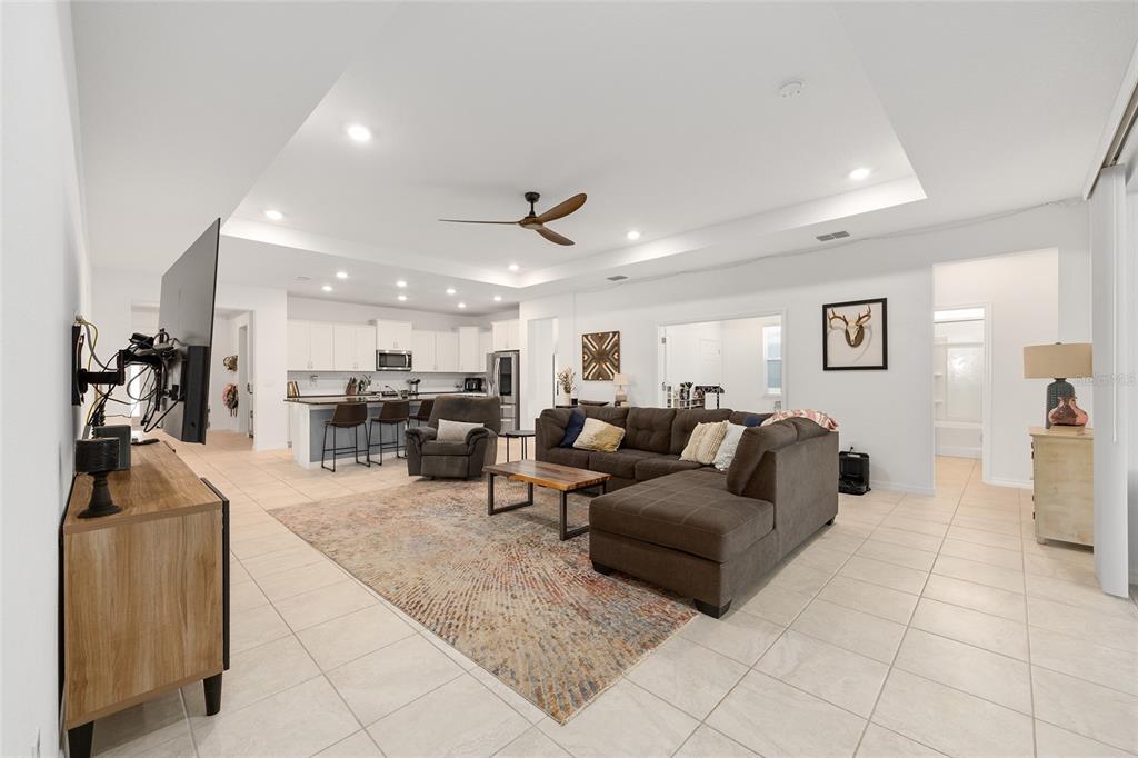 7431 Southwest 65th Place Road Ocala, FL 34474 - Photo 15 of 49 a living room with furniture and a view of kitchen