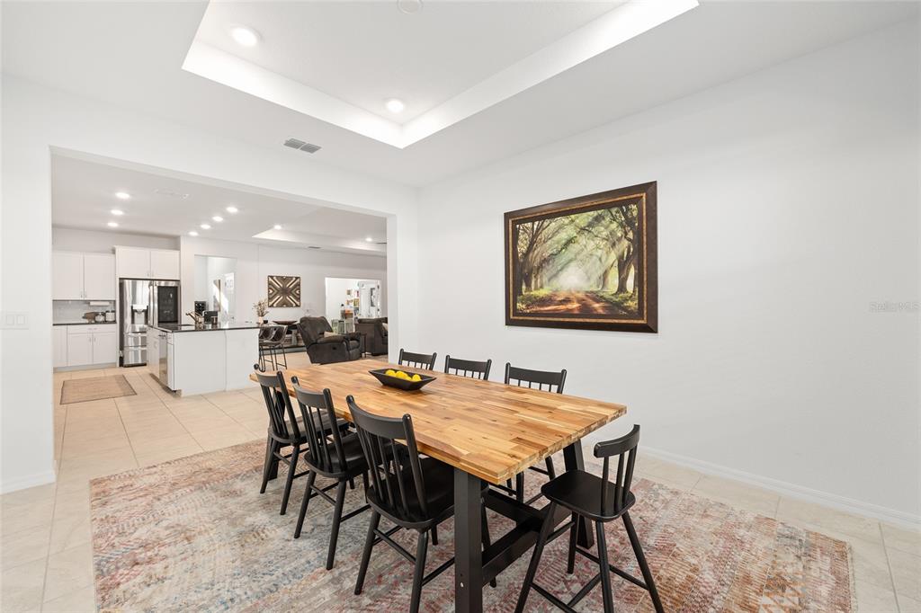 7431 Southwest 65th Place Road Ocala, FL 34474 - Photo 18 of 49 a view of a dining room with furniture