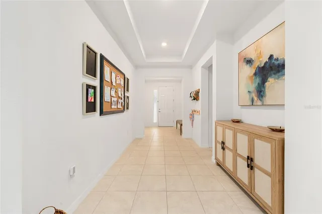 a view of a hallway with a furniture